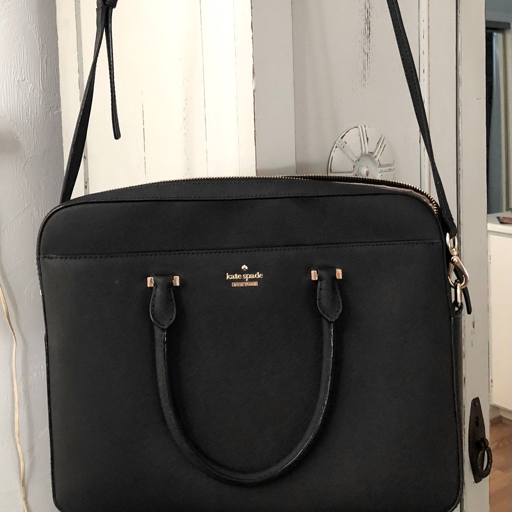 Off to work in style with this Saffiano leather laptop bag.